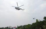 Mãn nhãn màn biểu diễn của Su-30Mk2 và trực thăng mang cờ Tổ quốc ở Hà Nội ảnh 1