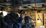 [ẢNH] Chiến hạm Trung Quốc huấn luyện bắn đạn thật trong thời tiết xấu