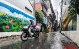 [ẢNH] Hà Nội đẹp lạ dưới mưa trong Ngày kỷ niệm 67 năm giải phóng Thủ đô