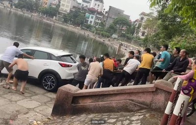 Clip hàng chục người kéo ô tô từ hồ Định Công lên bờ được khen ngợi
