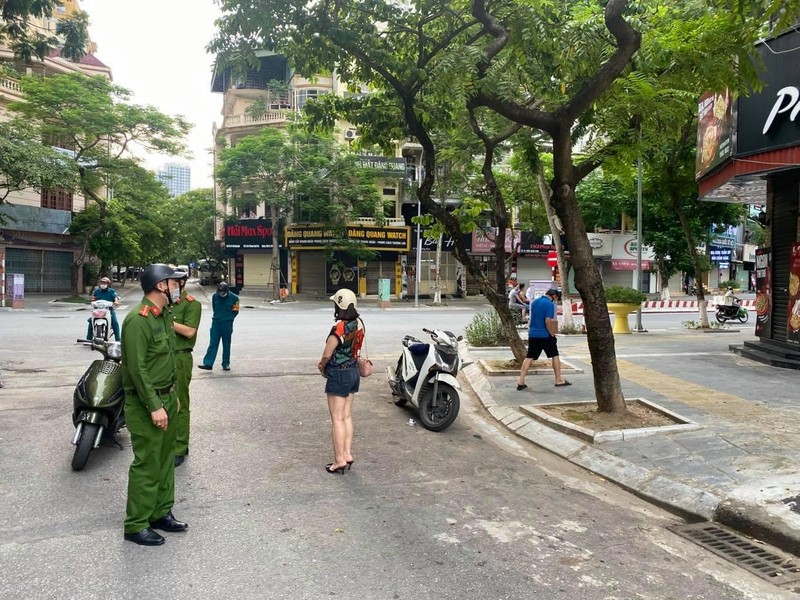 Xử phạt nghiêm người dân ra đường không có lý do chính đáng ảnh 11