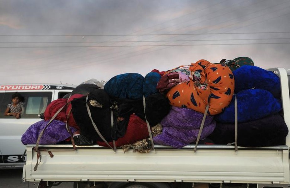 [ẢNH] Người Kurd trốn chạy khỏi cuộc tấn công của Thổ Nhĩ Kỳ vào vùng đông bắc Syria