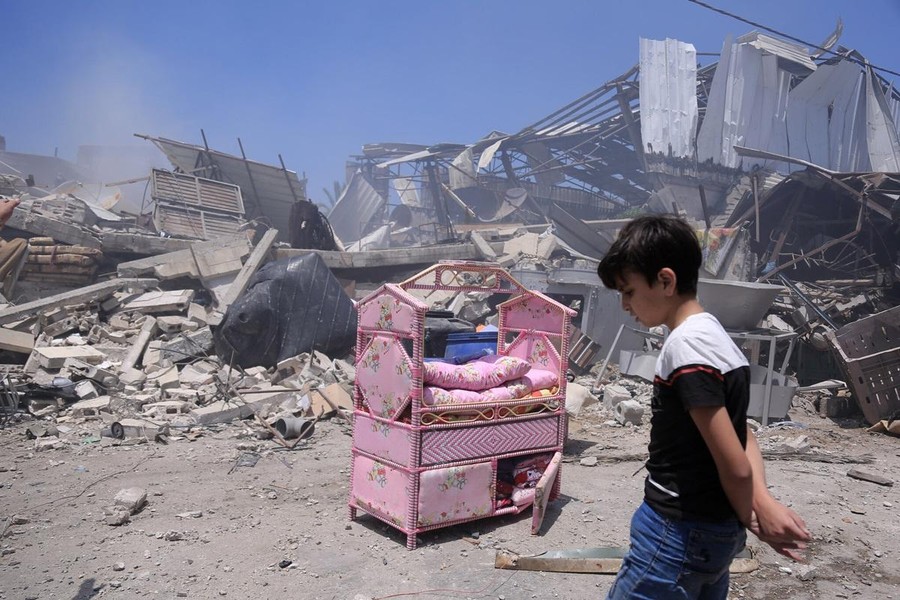 [ẢNH] Cách Israel đuổi thường dân ra ngoài trước khi đánh sập các tòa nhà tại dải Gaza