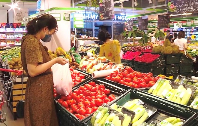 Lạm phát giảm, lương tăng: Làm sao để người tiêu dùng có niềm vui “kép”? ảnh 2