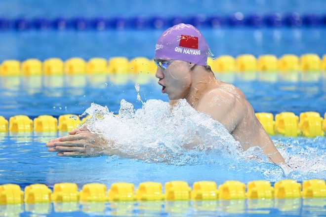 Chủ nhà Trung Quốc giành 4 huy chương vàng trong 6 nội dung thi môn bơi ngày 27-9, trong đó có kỷ lục ASIAD mới ở 4x100m tiếp sức hỗn hợp ảnh 1